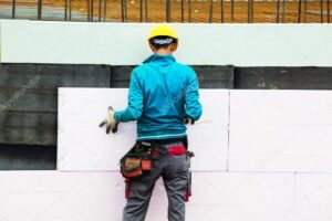 depositphotos 14042979 stock photo construction workers and insulation