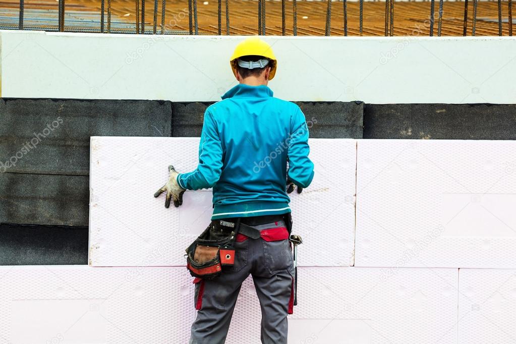 depositphotos 14042979 stock photo construction workers and insulation